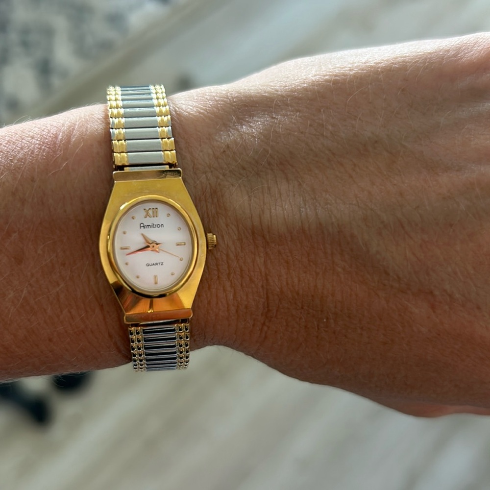 Armitron gold and silver stretch band watch